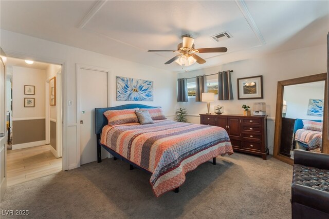 908 Bonita Ave, Las Vegas, NV 89104 - bedroom with light colored carpet and ceiling fan