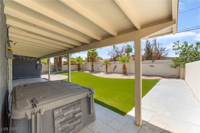 908 Bonita Ave, Las Vegas, NV 89104 - fenced backyard with a patio and a hot tub