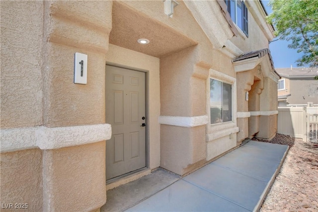 3617 Indigo Flower St Unit 1, North Las Vegas, NV 89084 - view of exterior entry featuring stucco siding