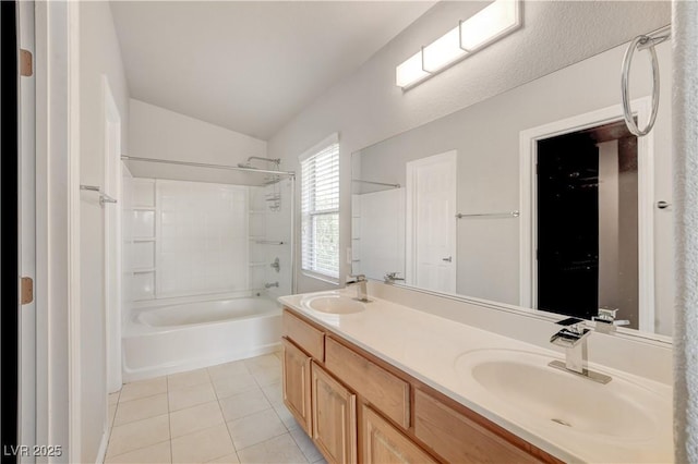 3617 Indigo Flower St Unit 1, North Las Vegas, NV 89084 - bathroom with tile patterned floors, double vanity, shower / bath combination, vaulted ceiling, and a closet