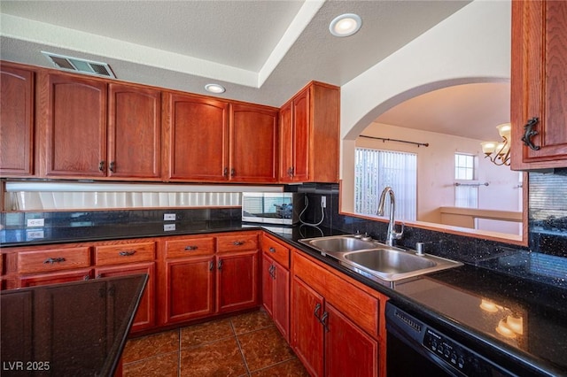 8708 Western Saddle Ave, Las Vegas, NV 89129 - kitchen featuring dishwasher, arched walkways, a chandelier, dark tile patterned flooring, and recessed lighting