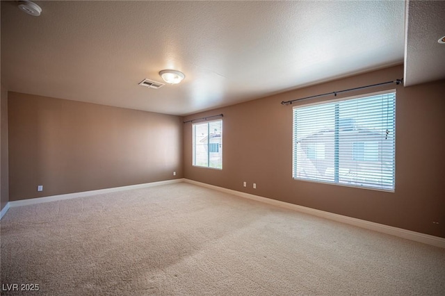 8708 Western Saddle Ave, Las Vegas, NV 89129 - spare room featuring a smoke detector, carpet floors, and a textured ceiling