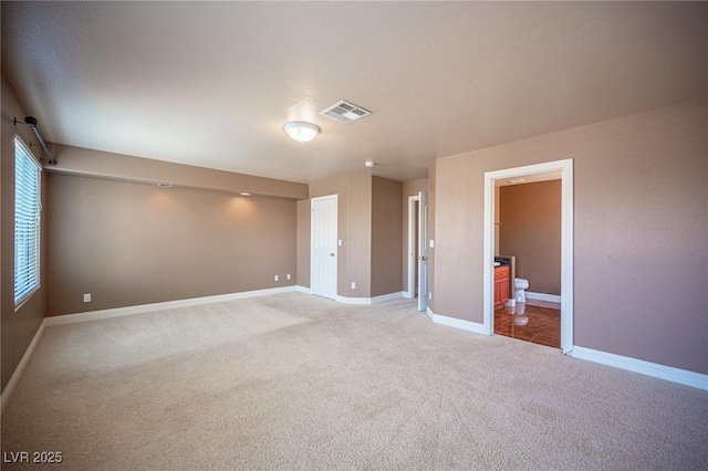 8708 Western Saddle Ave, Las Vegas, NV 89129 - unfurnished room featuring light carpet and baseboards