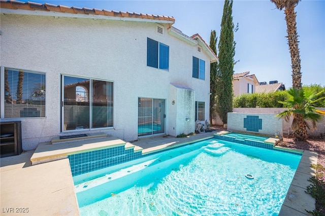 8708 Western Saddle Ave, Las Vegas, NV 89129 - view of pool featuring a pool with connected hot tub and a patio
