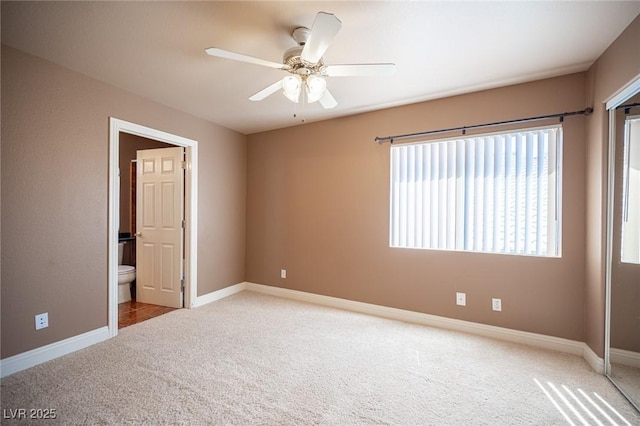 8708 Western Saddle Ave, Las Vegas, NV 89129 - unfurnished bedroom featuring carpet flooring, ceiling fan, and ensuite bathroom