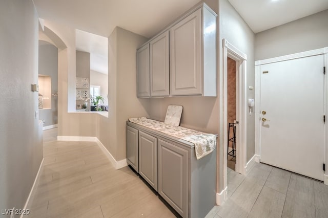 1131 Magic Meadow St, Henderson, NV 89052 - washroom featuring arched walkways and light wood-style floors