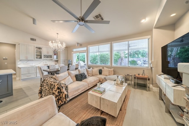 1131 Magic Meadow St, Henderson, NV 89052 - living room featuring lofted ceiling, a chandelier, light wood-style flooring, ceiling fan, and recessed lighting