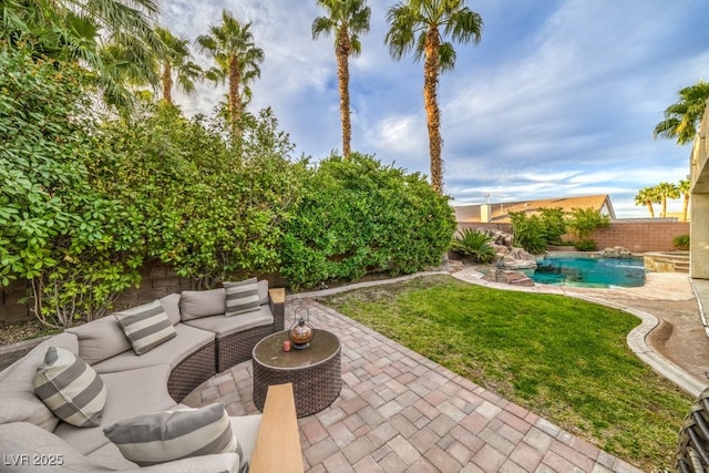 1131 Magic Meadow St, Henderson, NV 89052 - fenced backyard with a patio area and an outdoor hangout area