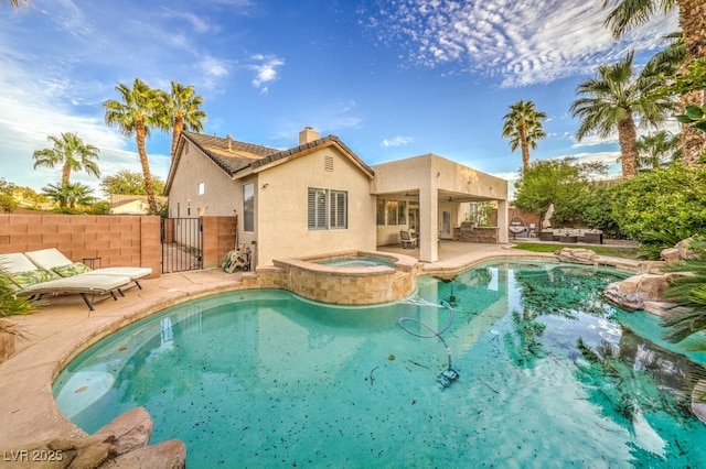 1131 Magic Meadow St, Henderson, NV 89052 - view of pool with a gate, a patio, and a pool with connected hot tub