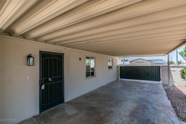 148 Fir St, Henderson, NV 89015 - view of patio with an attached carport