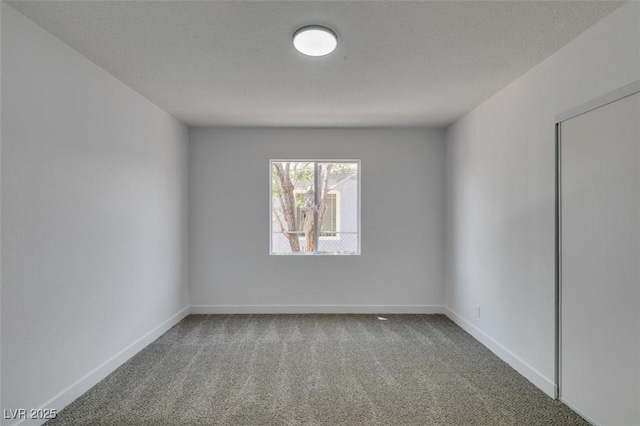 148 Fir St, Henderson, NV 89015 - carpeted spare room with baseboards