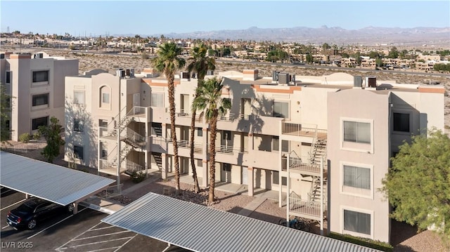 2028 Mesquite Ln Unit 302, Laughlin, NV 89029 - view of property featuring a mountain view and a parking lot