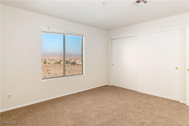 2028 Mesquite Ln Unit 302, Laughlin, NV 89029 - carpeted empty room featuring baseboards