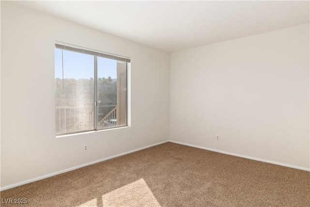 2028 Mesquite Ln Unit 302, Laughlin, NV 89029 - spare room featuring carpet flooring and baseboards