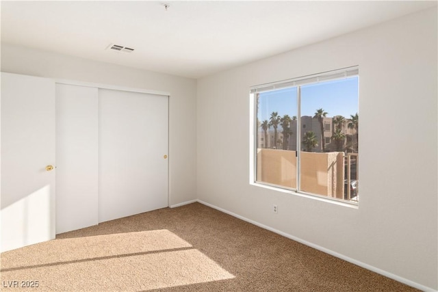 2028 Mesquite Ln Unit 302, Laughlin, NV 89029 - unfurnished bedroom with carpet floors and a closet