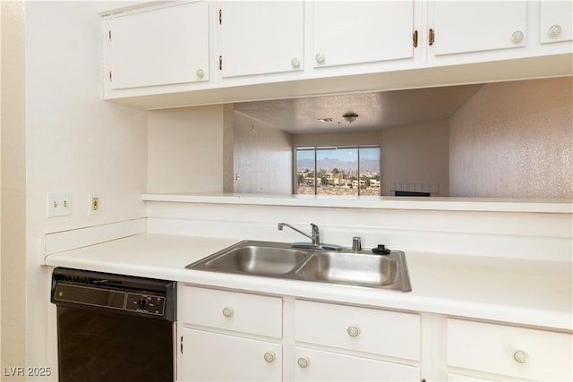 2028 Mesquite Ln Unit 302, Laughlin, NV 89029 - kitchen with dishwasher, light countertops, and white cabinetry