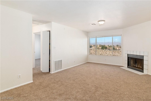 2028 Mesquite Ln Unit 302, Laughlin, NV 89029 - unfurnished living room with carpet flooring and a fireplace