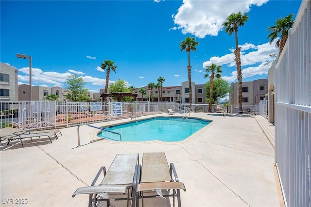 2028 Mesquite Ln Unit 302, Laughlin, NV 89029 - community pool with a patio and a residential view