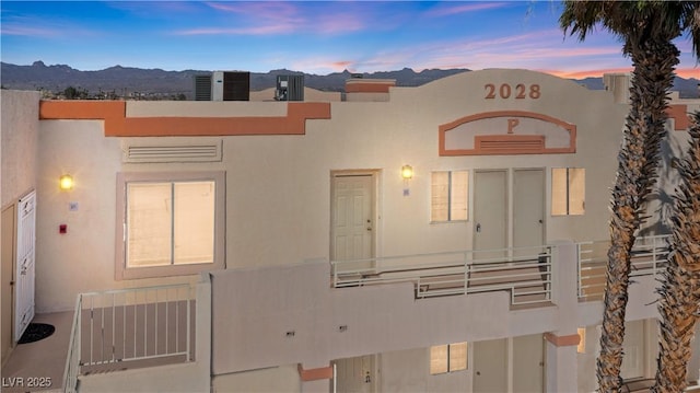 2028 Mesquite Ln Unit 302, Laughlin, NV 89029 - view of front of house featuring stucco siding and a mountain view
