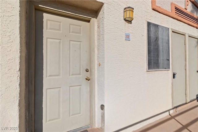 2028 Mesquite Ln Unit 302, Laughlin, NV 89029 - entrance to property featuring stucco siding