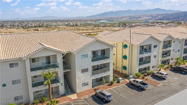 3550 Bay Sands Dr Unit 3096, Laughlin, NV 89029 - view of property with uncovered parking and a mountain view