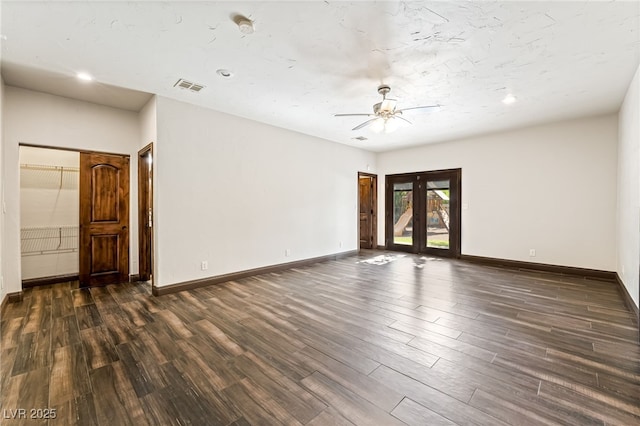 7154 Ranchito Cir, Las Vegas, NV 89120 - spare room with dark wood finished floors, french doors, ceiling fan, recessed lighting, and a smoke detector