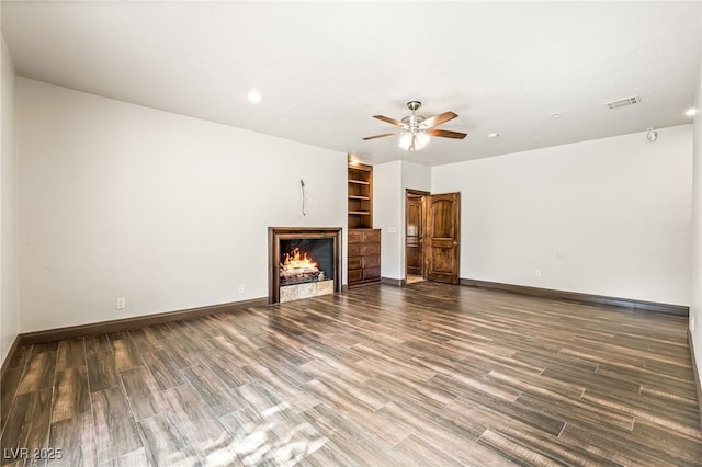 7154 Ranchito Cir, Las Vegas, NV 89120 - unfurnished living room with ceiling fan, wood finished floors, and a warm lit fireplace