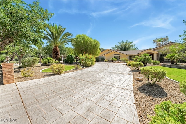 7154 Ranchito Cir, Las Vegas, NV 89120 - view of front of house with curved driveway