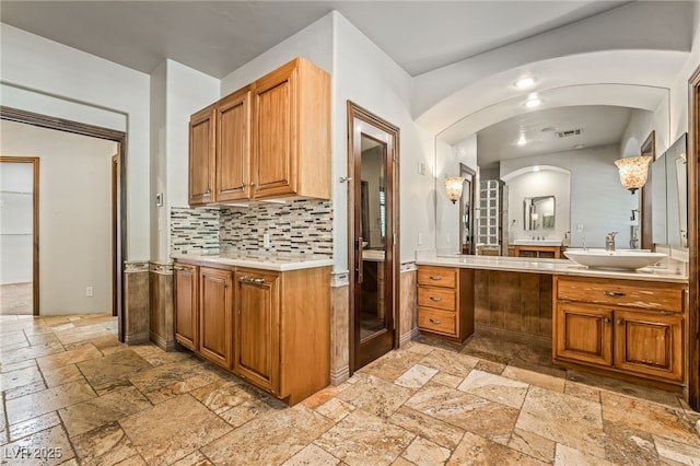 7154 Ranchito Cir, Las Vegas, NV 89120 - full bathroom with stone tile flooring, vanity, and tasteful backsplash