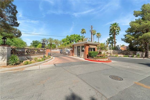7154 Ranchito Cir, Las Vegas, NV 89120 - view of front of property featuring a gate and driveway