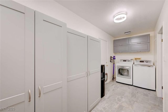 1412 5th St, Boulder City, NV 89005 - washroom featuring washing machine and clothes dryer and light marble finish floors