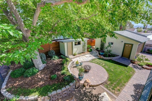 1412 5th St, Boulder City, NV 89005 - fenced backyard featuring a storage unit