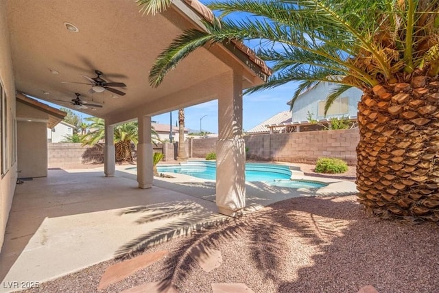 9794 Ice Box Canyon Ct, Las Vegas, NV 89117 - view of swimming pool with ceiling fan, a fenced backyard, a patio, and a pool with connected hot tub