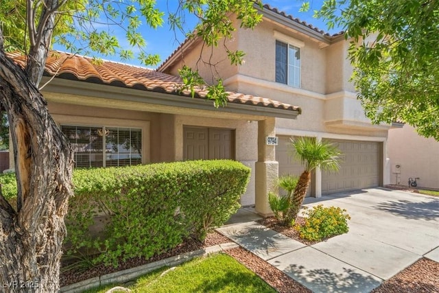9794 Ice Box Canyon Ct, Las Vegas, NV 89117 - mediterranean / spanish home with a tiled roof, a garage, driveway, and stucco siding