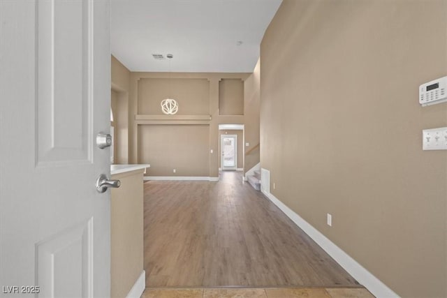 9794 Ice Box Canyon Ct, Las Vegas, NV 89117 - entrance foyer featuring stairs and light wood-type flooring