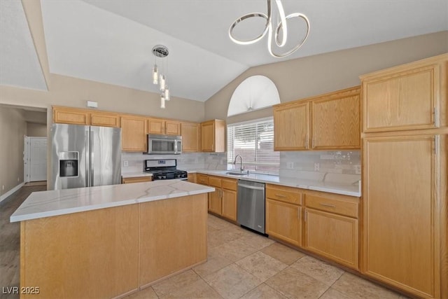 9794 Ice Box Canyon Ct, Las Vegas, NV 89117 - kitchen with stainless steel appliances, tasteful backsplash, light countertops, lofted ceiling, and a center island