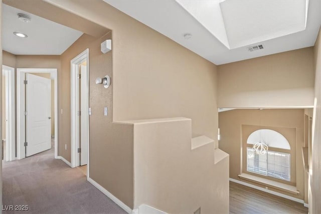 9794 Ice Box Canyon Ct, Las Vegas, NV 89117 - hall featuring baseboards and a skylight