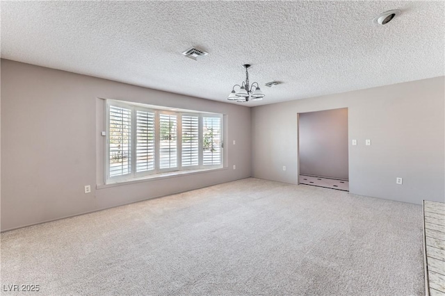 2780 Montessouri St, Las Vegas, NV 89117 - carpeted spare room with a chandelier and a textured ceiling
