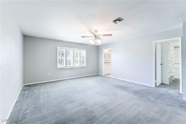 2780 Montessouri St, Las Vegas, NV 89117 - empty room with a ceiling fan and carpet flooring