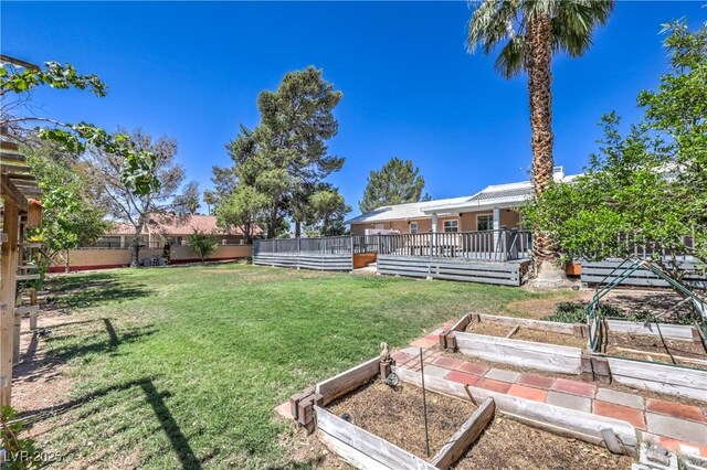 2780 Montessouri St, Las Vegas, NV 89117 - fenced backyard with a garden