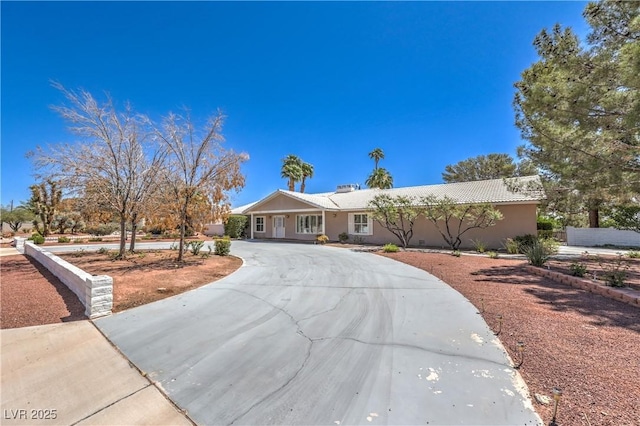 2780 Montessouri St, Las Vegas, NV 89117 - single story home featuring curved driveway and stucco siding