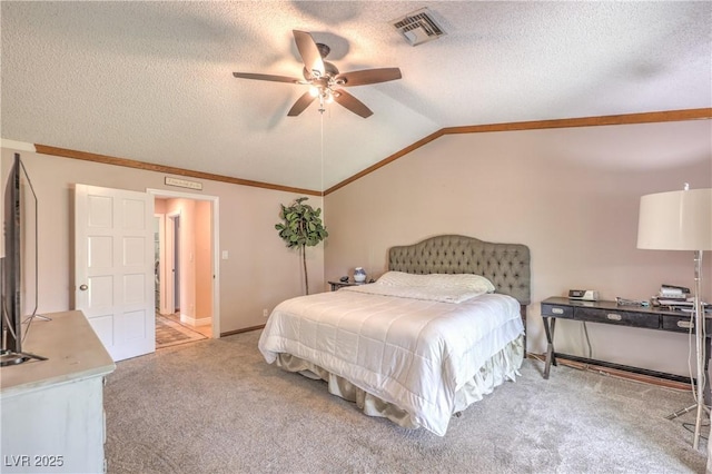 1605 Siboney Dr, Las Vegas, NV 89123 - bedroom featuring lofted ceiling, carpet flooring, a textured ceiling, ornamental molding, and a ceiling fan