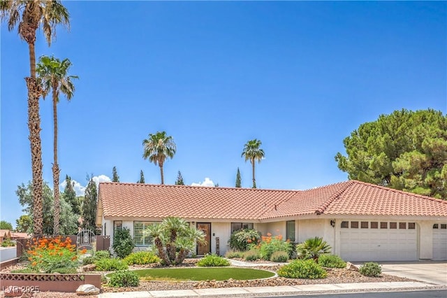 1605 Siboney Dr, Las Vegas, NV 89123 - single story home with a tile roof, an attached garage, and stucco siding