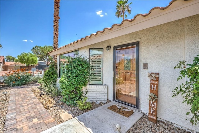 1605 Siboney Dr, Las Vegas, NV 89123 - doorway to property with stucco siding and brick siding