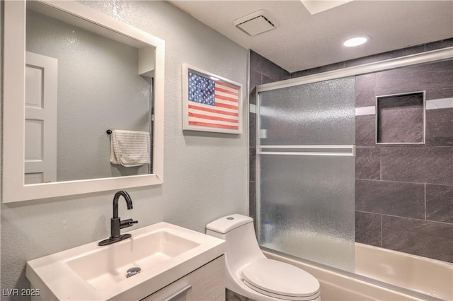 1605 Siboney Dr, Las Vegas, NV 89123 - bathroom with vanity, shower / bath combination with glass door, and a textured wall