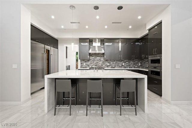 11 Hawkeye Ln, Las Vegas, NV 89135 - kitchen with wall chimney range hood, modern cabinets, backsplash, and recessed lighting