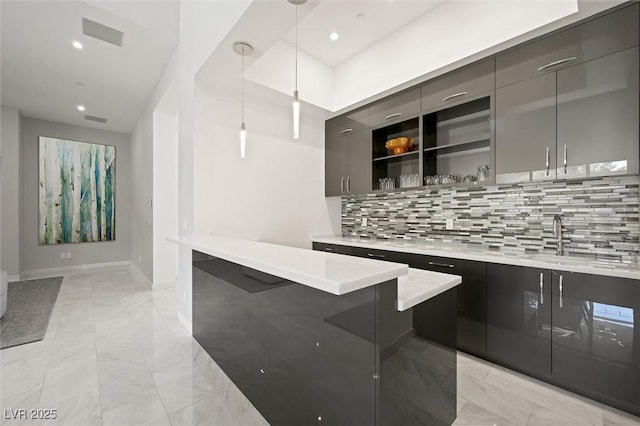 11 Hawkeye Ln, Las Vegas, NV 89135 - bar area with light marble finish floors, decorative backsplash, pendant lighting, and recessed lighting