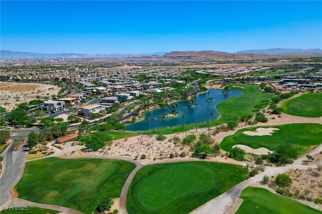 11 Hawkeye Ln, Las Vegas, NV 89135 - aerial perspective of suburban area featuring a water and mountain view and a golf club
