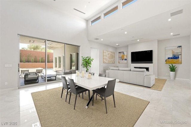 11 Hawkeye Ln, Las Vegas, NV 89135 - dining space featuring light marble finish floors and recessed lighting
