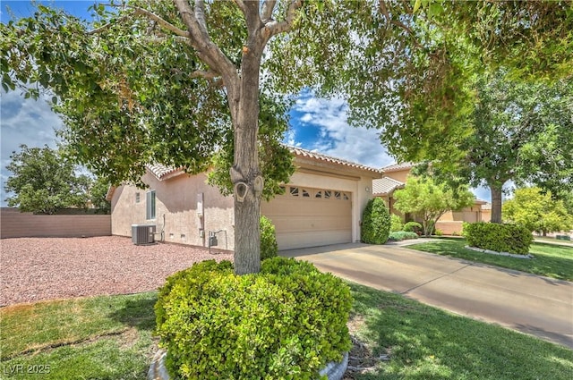 233 Ventana Heights St, Henderson, NV 89074 - view of front of home featuring a tile roof, stucco siding, concrete driveway, and an attached garage